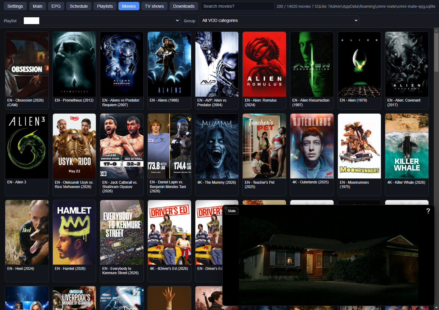 OmniMate TV player showing a movie library with the built-in video player and stats overlay